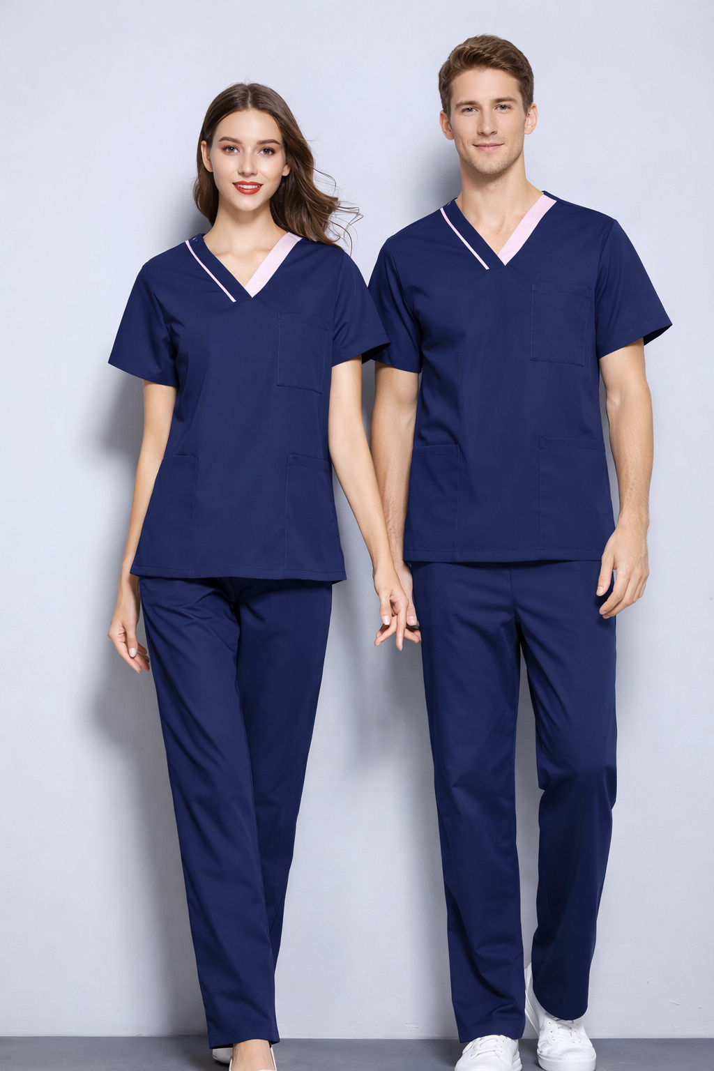 HITO AT1 navy blue scrub top with pink contrast collar